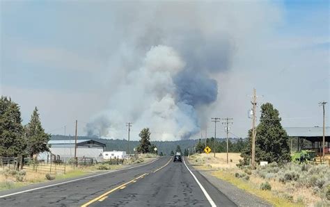 Golden Fire in southern Oregon burns dozens of homes and cuts 911 service